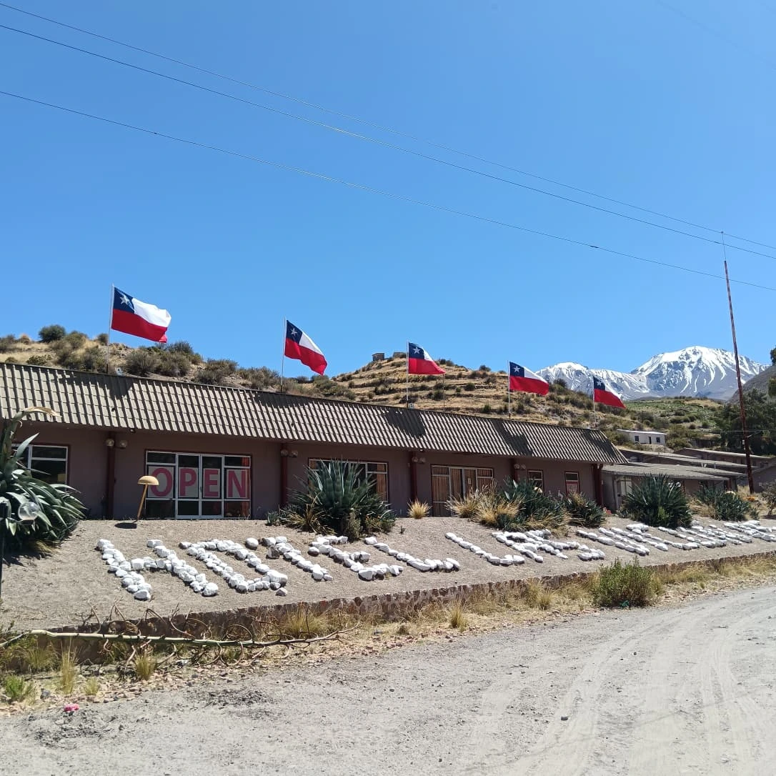 Hotel Las Vicuñas exterior, the base of Villa Volcán Tours in Putre